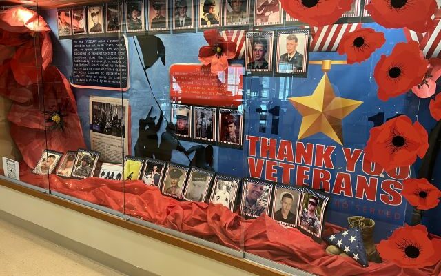 Students at the Waynesville Career Center design a large display case to honor the nation’s veterans.